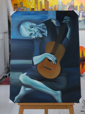 The Old Guitarist by Pablo Picasso